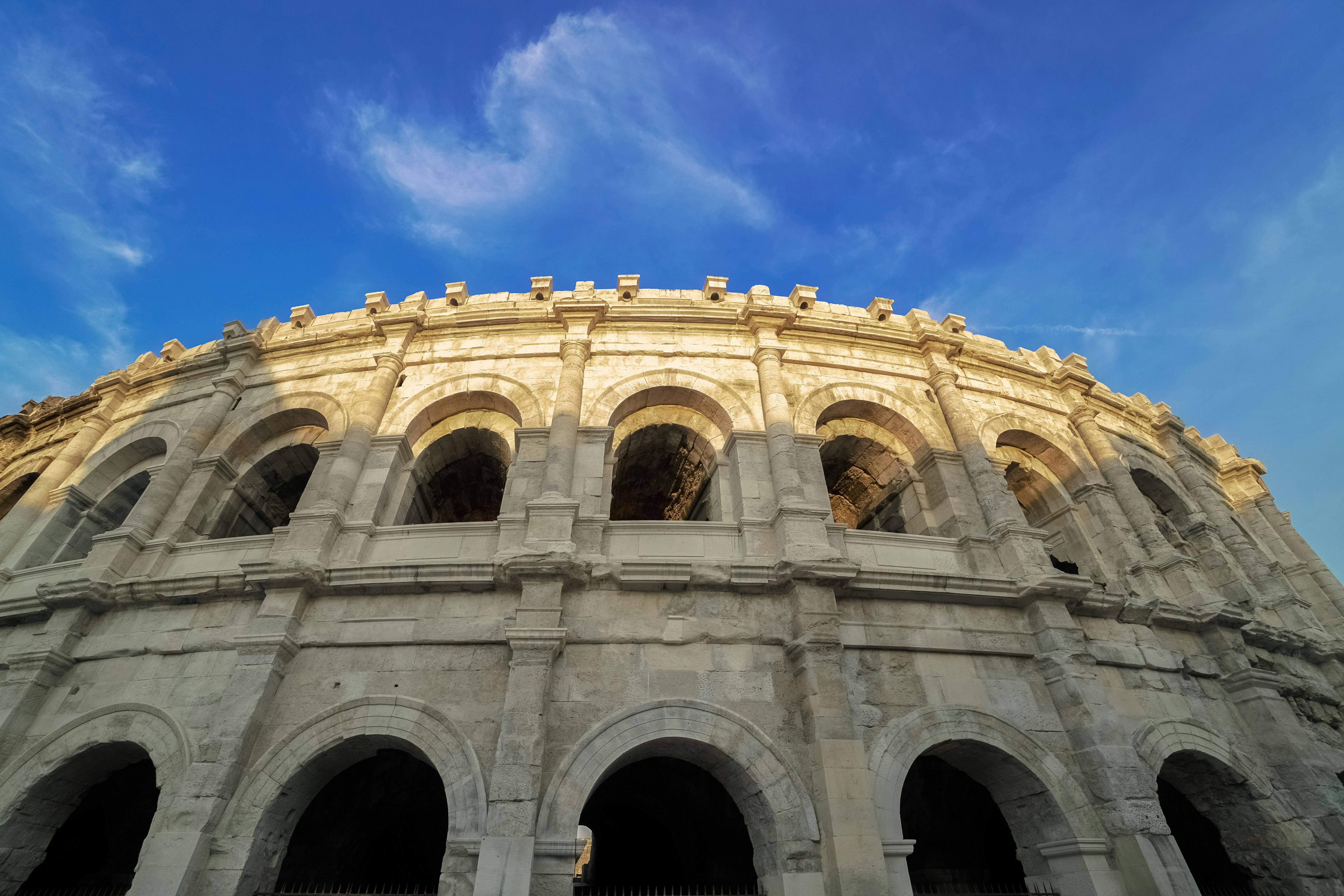 brown concrete building under blue sky during daytime